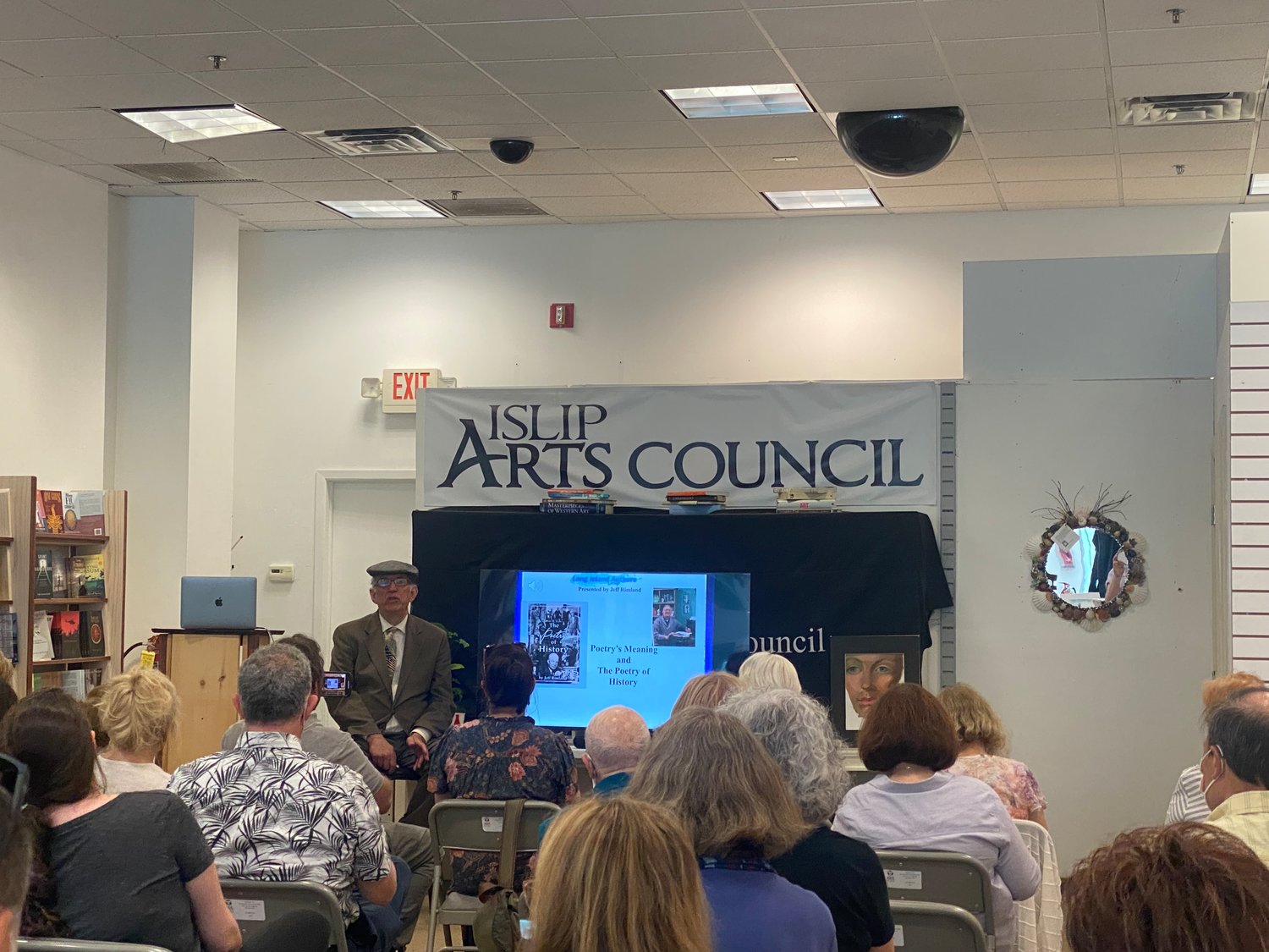 Author Jeff Rimland presented and read excerpts from his new book of poetry at the Islip Arts Council gallery.